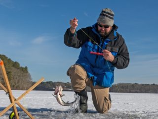 Learn a few tips and techniques to safely go ice fishing and catch northern pike, trout, largemouth, smallmouth, panfish, and more.