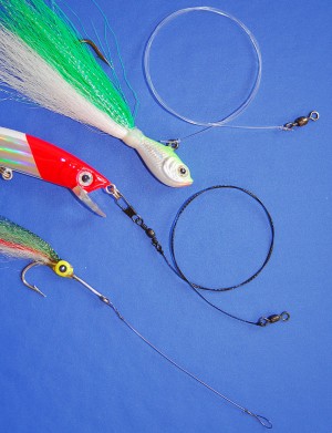 Unique knots and connections are used with different leader materials: a leadhead jig rigged with heavy mono and clinch knots (top); a swimmer rigged with wire braid, figure-8 knots and a snap swivel (center); and a fly rigged with single-strand wire and haywire twists (bottom).