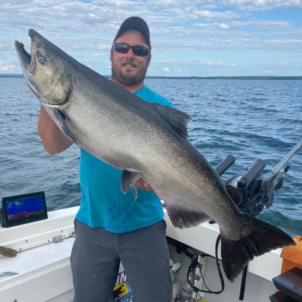 Nick M. holds massive king salmon